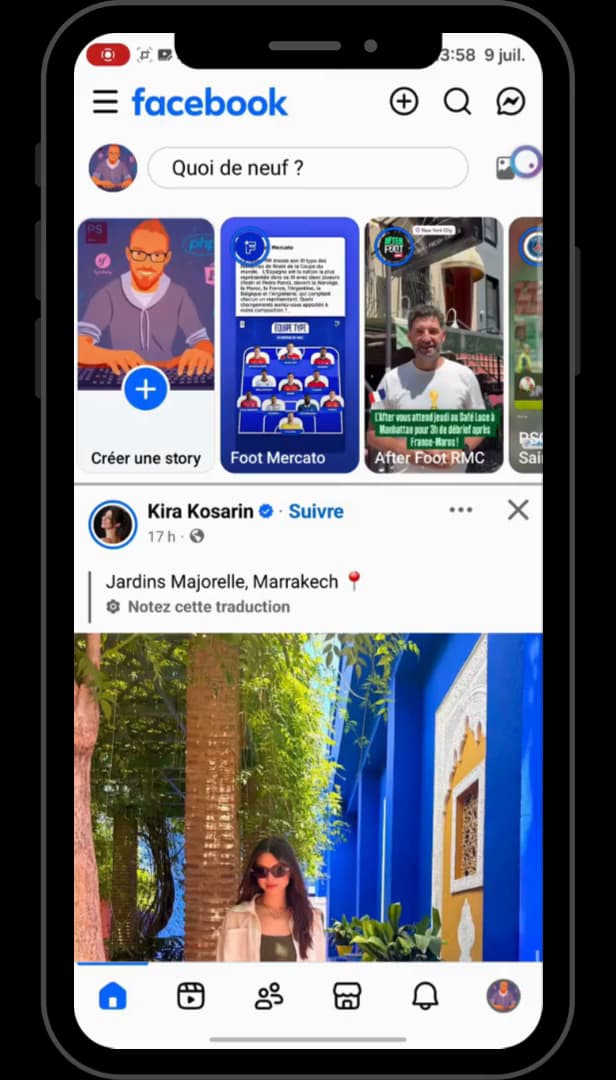Facebook app news feed open on a phone